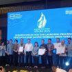 Foto bersama usai penandatanganan MoU dan Launching Program Penguatan Bank Sampah berbasis UMKM Versi 2.0.
